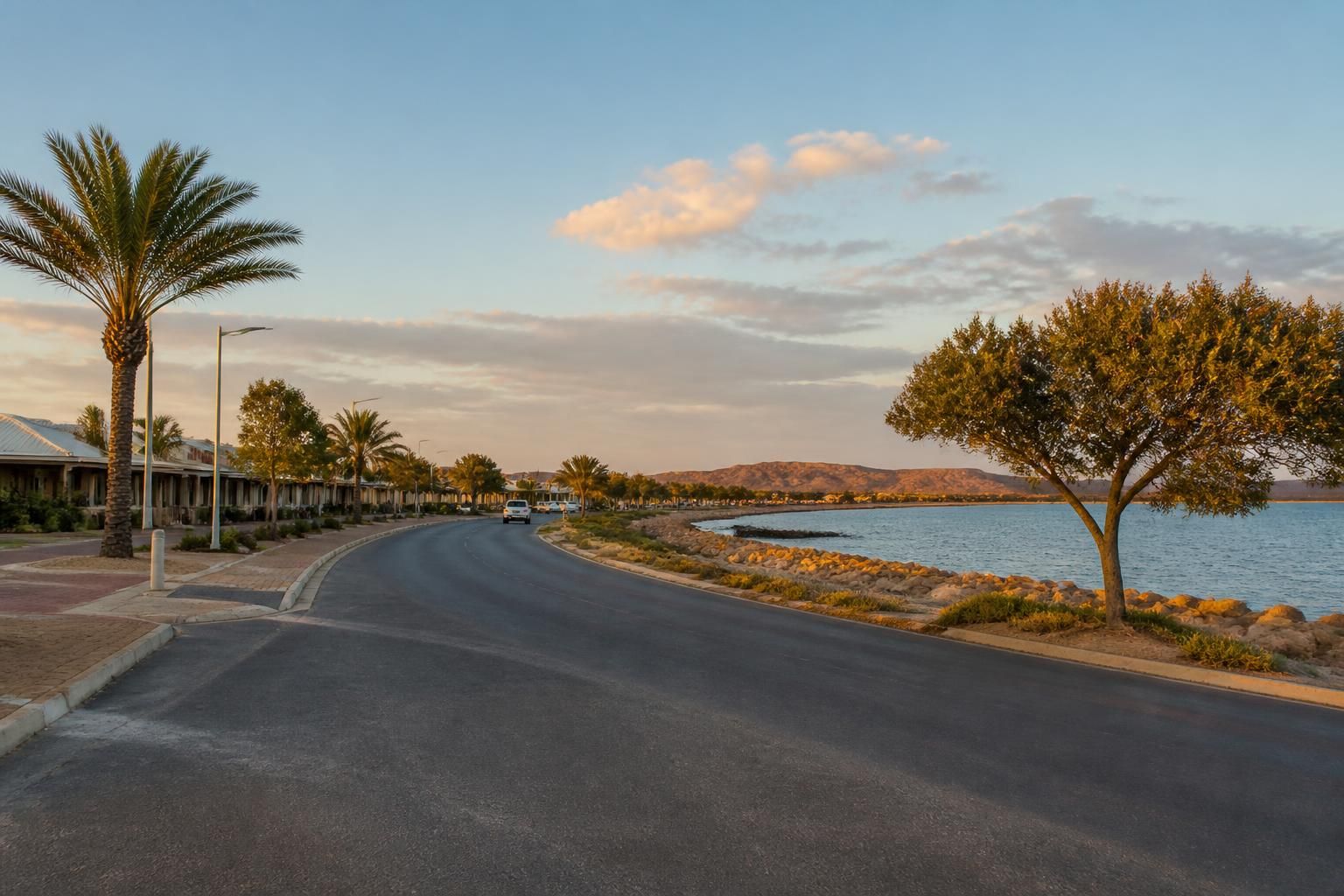 Regional coastal town streetscape with open sky in Onslow
